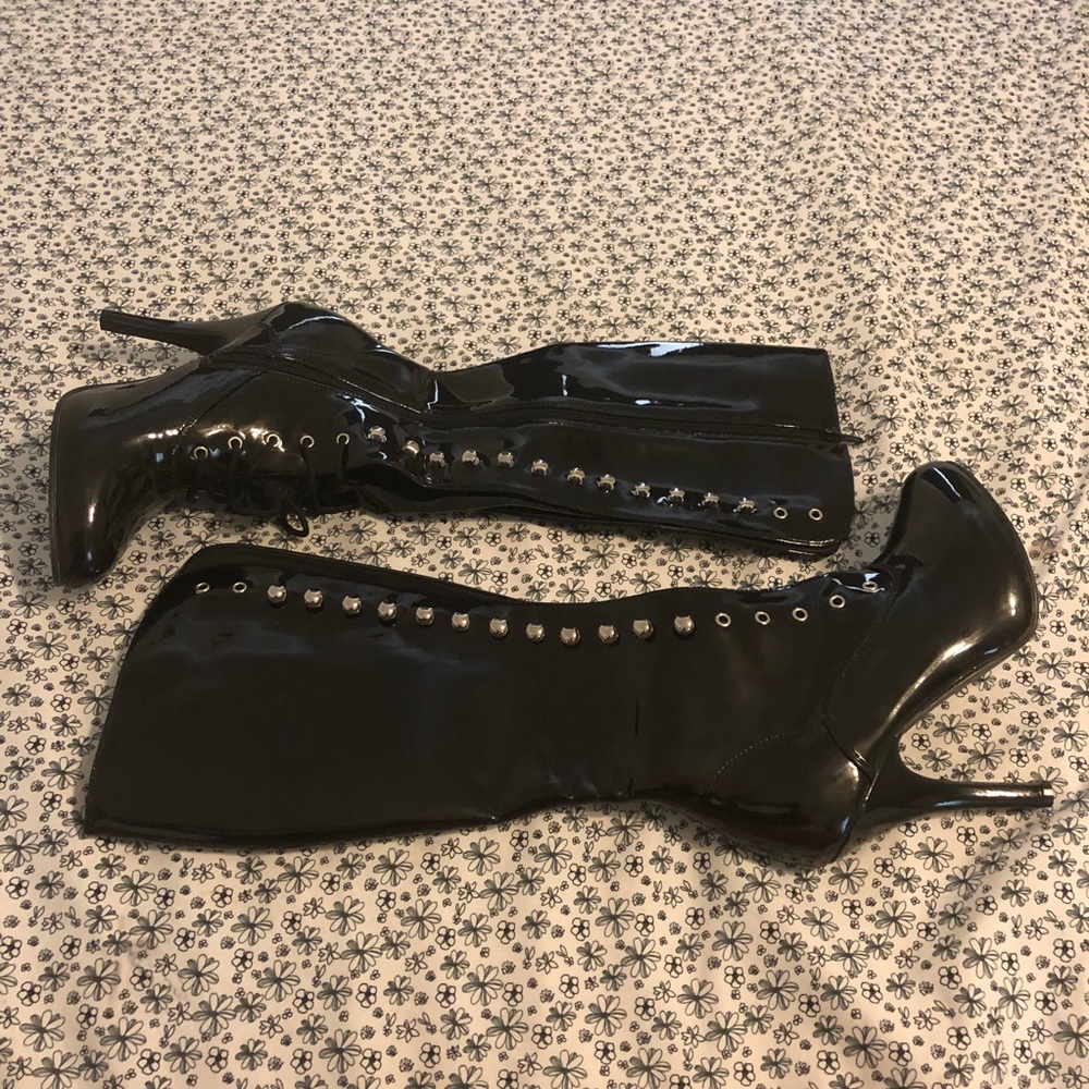 knee high black patent leather lace-up boot